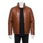 A ginger-brown leather puffer jacket mens fashion piece featuring unique brick-pattern quilting and a high-stand collar, showcased by Custom Jackets USA.