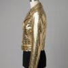 Detailed shot of metallic gold crocodile womens leather biker jackets with a biker ladies leather jacket finish.