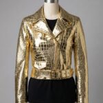Detailed shot of metallic gold crocodile womens leather biker jackets with a biker ladies leather jacket finish.