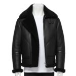 A luxury all-black aviator jacket mens with black shearling fur lining and collar, featuring sleek zippers and a tailored fit, showcased by Custom Jackets USA.