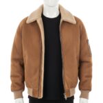 Front view of a Desert Sand tan shearling leather jacket mens with a plush cream collar.