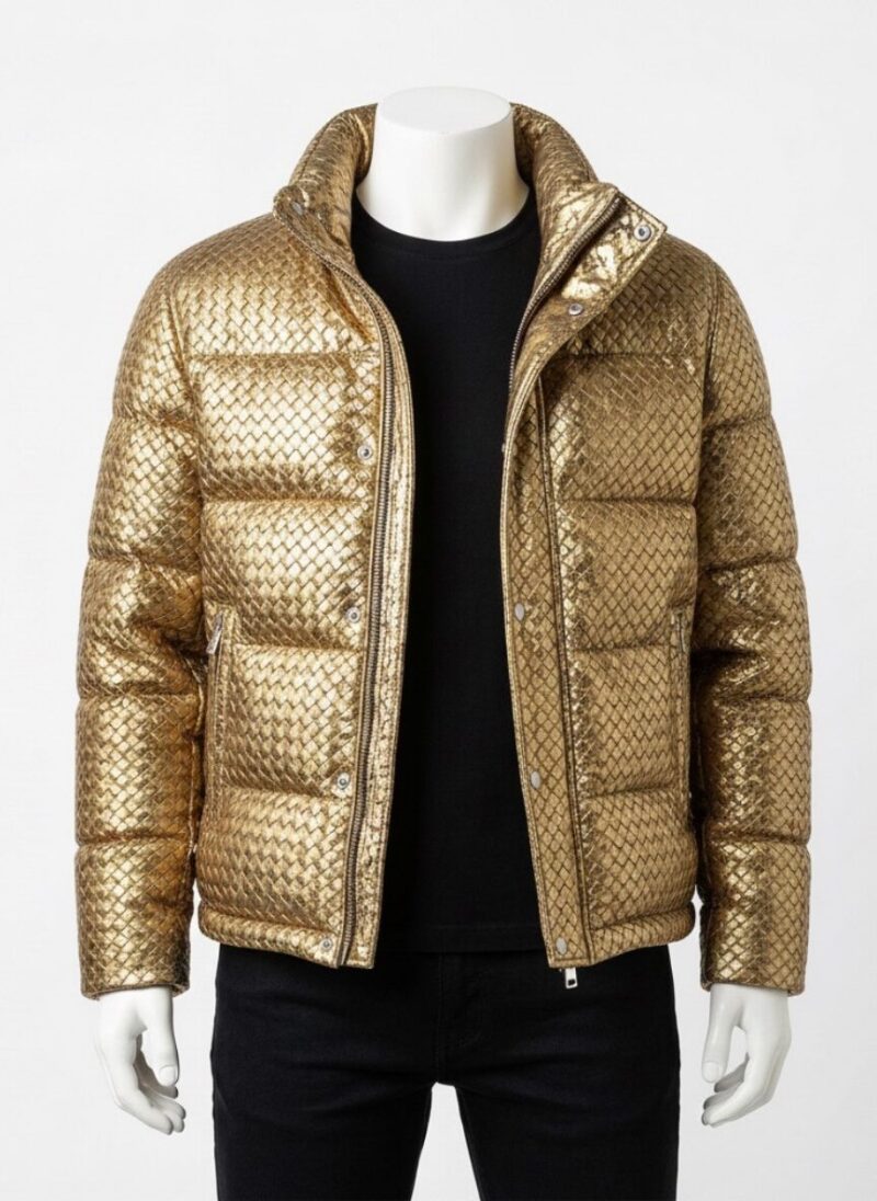 Man wearing a Custom Jackets USA metallic gold woven puffer jacket with horizontal quilting and a high stand collar against a clean white background.