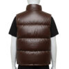 Detailed texture of the premium full-grain black leather on a wide-baffle puffer vest.
