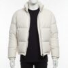 A premium ivory leather puffer jacket for men featuring a high stand collar and structured horizontal quilting.