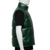 Close-up of the high-neck stand collar and zipper hardware on a green leather puffer vest.