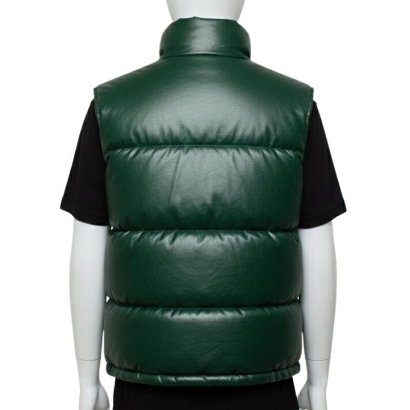 Close-up of the high-neck stand collar and zipper hardware on a green leather puffer vest.