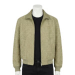 A luxury sage green hand-woven men's leather bomber jacket with a classic collar and ribbed cuffs, showcasing high-end texture and craftsmanship.