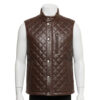 Mannequin wearing a men's rich brown diamond-quilted leather puffer vest with silver snap buttons and a stand-up collar.
