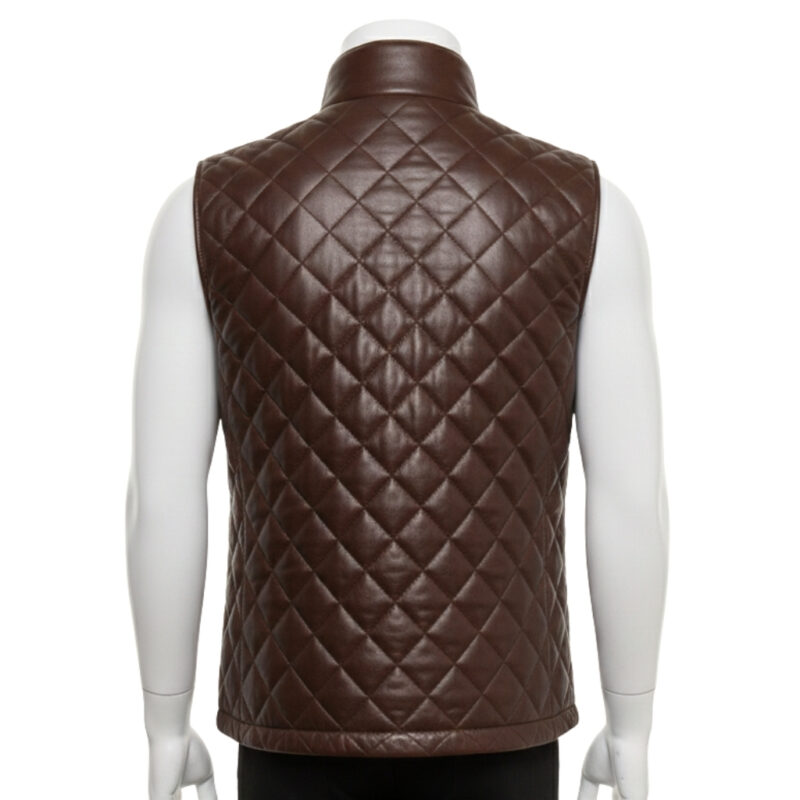 Mannequin wearing a men's rich brown diamond-quilted leather puffer vest with silver snap buttons and a stand-up collar.