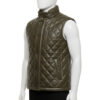 Mannequin wearing a men's olive green quilted leather puffer vest with silver snap buttons and a high collar.