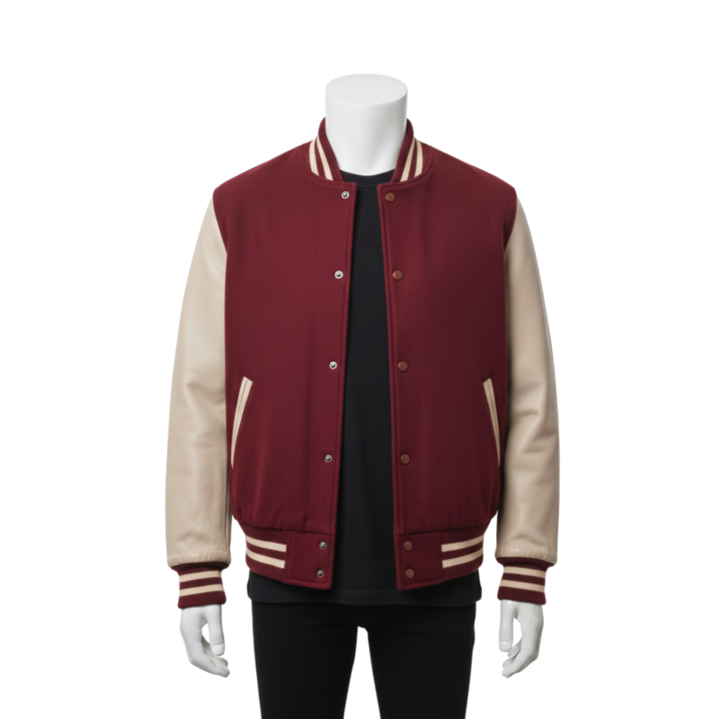 A man wearing a black and white black varsity letterman jacket with a personalized varsity jacket design.