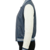 A high-end dusty navy ostrich leather varsity jacket for women.
