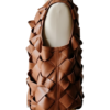A high-resolution image of a cinnamon woven garment showcasing a leather long vest women design for luxury wear.
