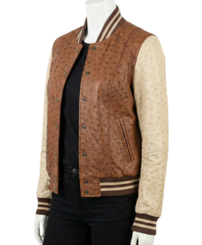 A high-end cognac and cream ostrich leather varsity jacket for women.