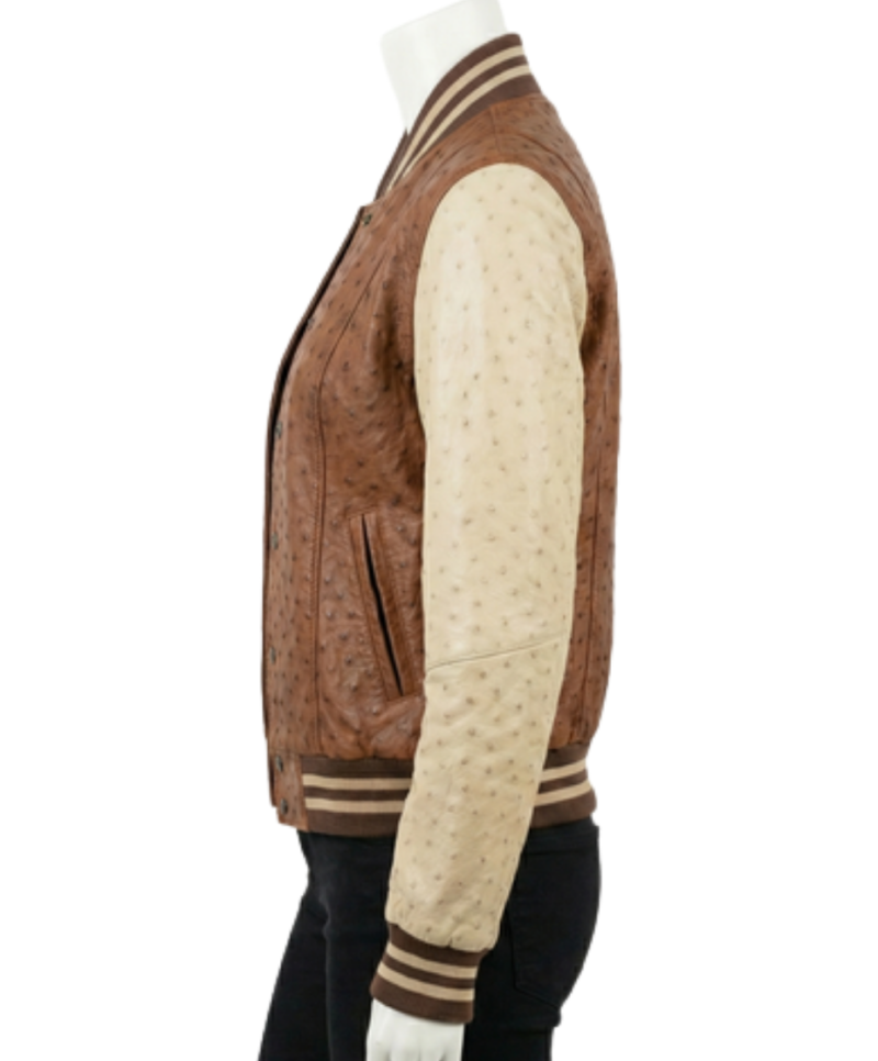 A high-end cognac and cream ostrich leather varsity jacket for women.