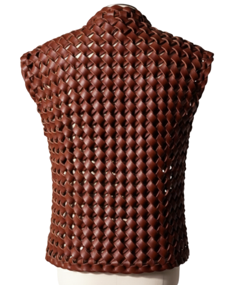 A handcrafted burnt maroon interlaced leather gilet women showing the womens leather vest jacket texture.