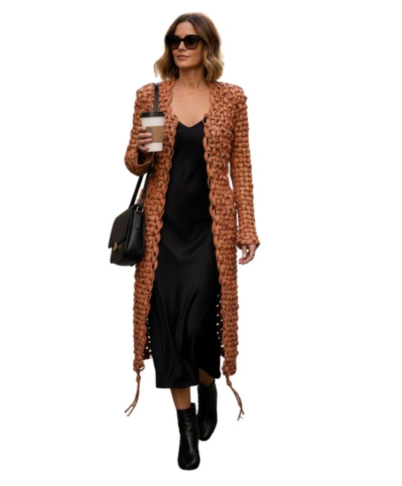 A high-end leather coat women featuring a detailed long leather coat women woven texture in saddle brown.