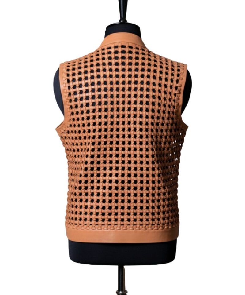 A high-end leather vest women featuring a detailed women's leather vest woven texture in pastel peach.