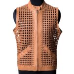 A high-end leather vest women featuring a detailed women's leather vest woven texture in pastel peach.