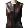 A handcrafted burnt coffee braided leather body warmer women showing the womens black leather vest texture.