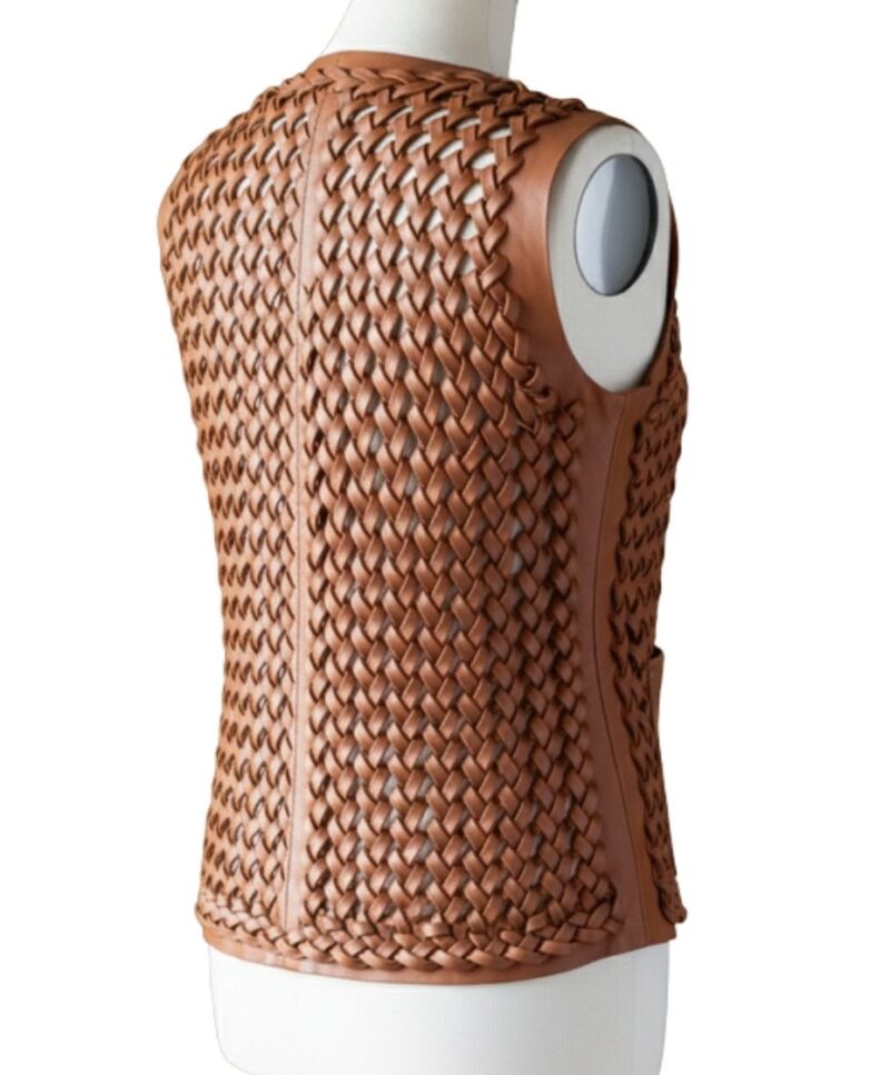 A high-end leather vest women featuring a detailed women's leather vest woven texture in metallic copper.