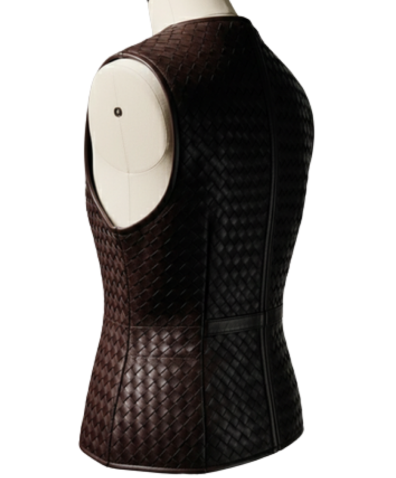 A handcrafted burnt coffee braided leather body warmer women showing the womens black leather vest texture.