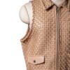 A high-end leather vest women featuring a detailed women's leather vest woven texture in cameo with a structured collar.