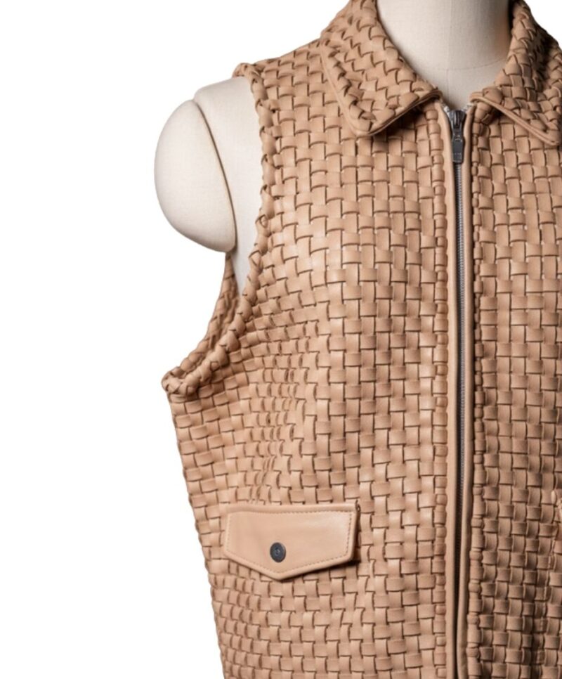 A high-end leather vest women featuring a detailed women's leather vest woven texture in cameo with a structured collar.