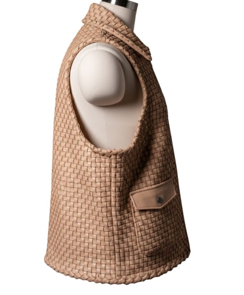 A high-end leather vest women featuring a detailed women's leather vest woven texture in cameo with a structured collar.