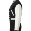 A luxury black and white design featuring the women's varsity bomber jacket style.