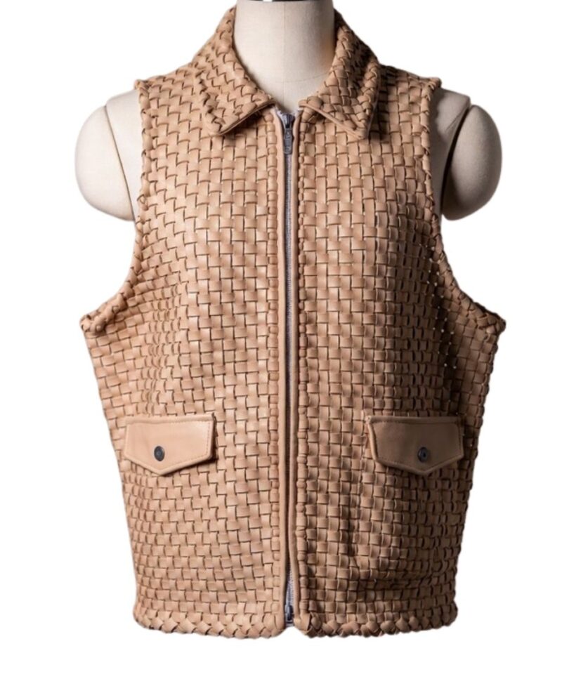 A high-end leather vest women featuring a detailed women's leather vest woven texture in cameo with a structured collar.