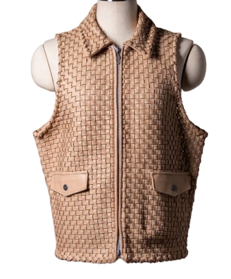 A high-end leather vest women featuring a detailed women's leather vest woven texture in cameo with a structured collar.