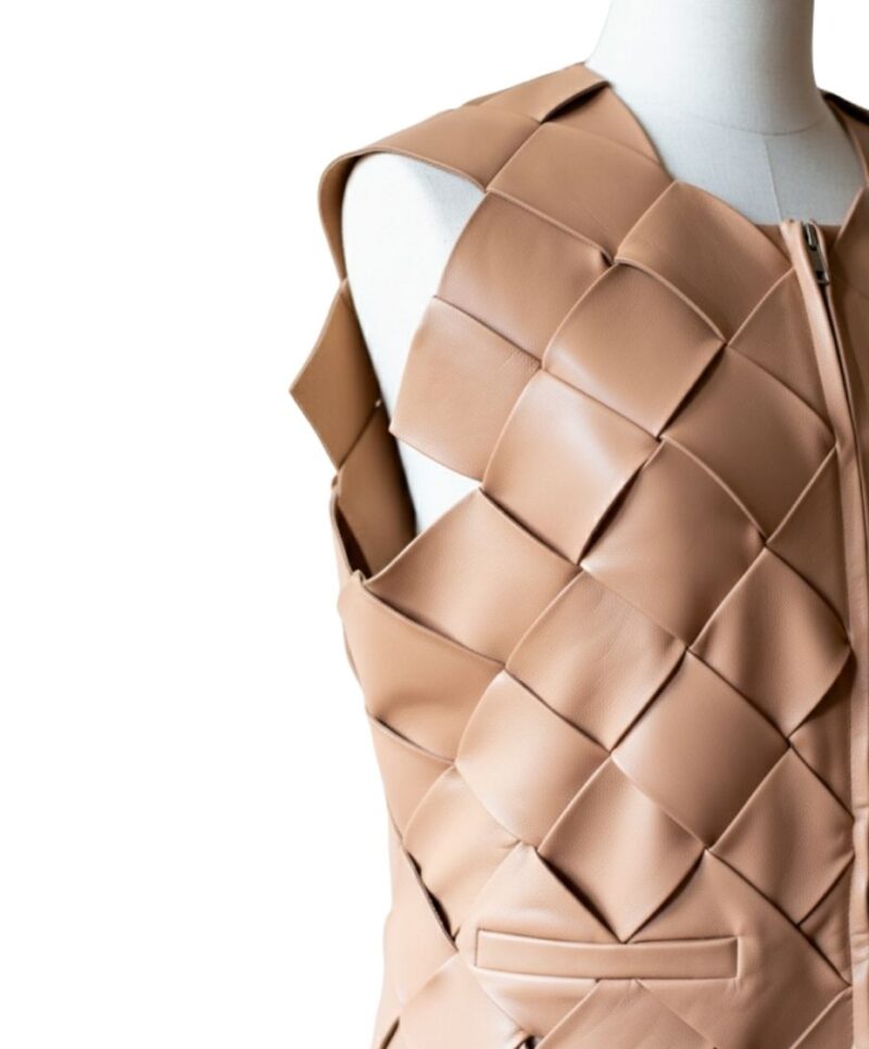 A high-end leather vest women featuring a detailed women's leather vest woven texture.