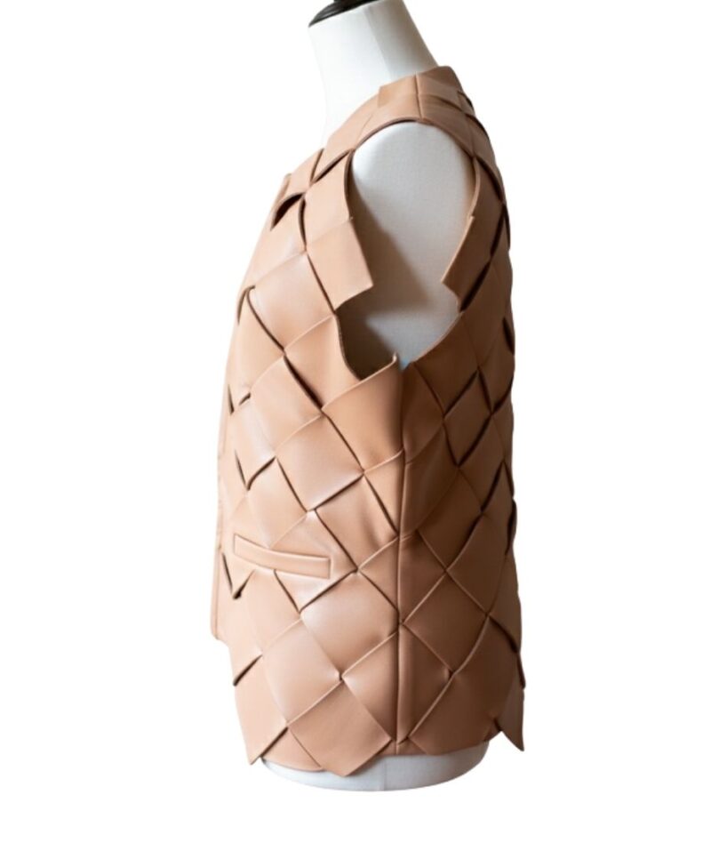 A high-end leather vest women featuring a detailed women's leather vest woven texture.