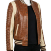 A high-end saddle brown crocodile leather outer garment for women.