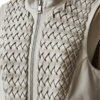 A handcrafted cloud grey woven leather vest women showing the leather vest for women texture.