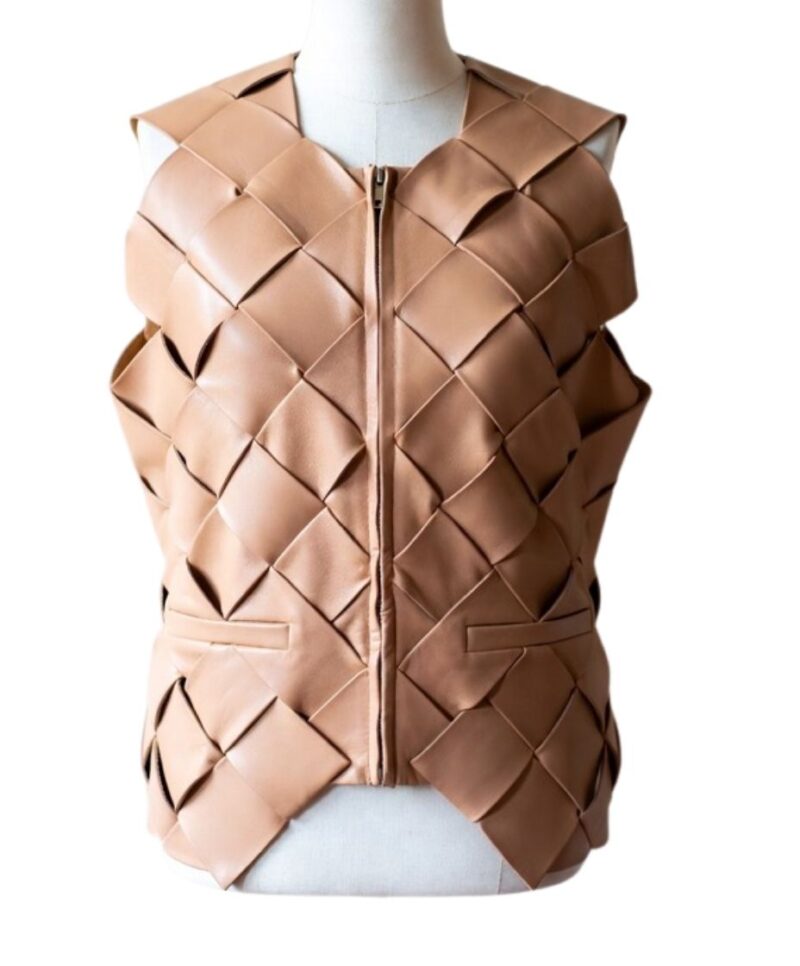A high-end leather vest women featuring a detailed women's leather vest woven texture.