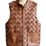 A handcrafted cognac interlaced leather gilet women showing the womens brown leather vest texture.