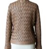 A high-end brown leather jacket women featuring a detailed leather jacket brown colour woven texture.