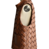 A handcrafted cognac interlaced leather gilet women showing the womens brown leather vest texture.