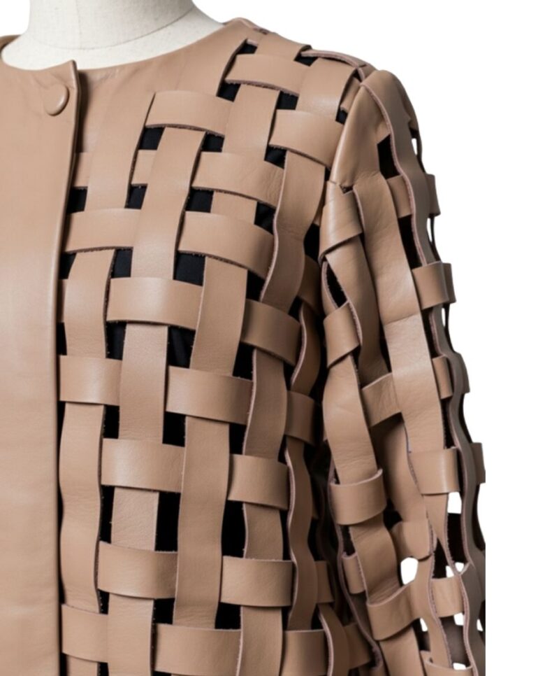 A high-end tan leather jacket featuring a detailed cream leather jacket woven texture.