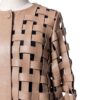 A high-end tan leather jacket featuring a detailed cream leather jacket woven texture.