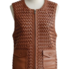 A handcrafted amber brown hand-woven leather body warmer women showing the leather motorcycle vest women texture.