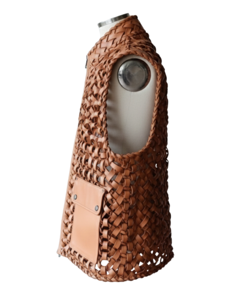 A handcrafted redwood genuine leather vest women showing the womens red leather vest texture.